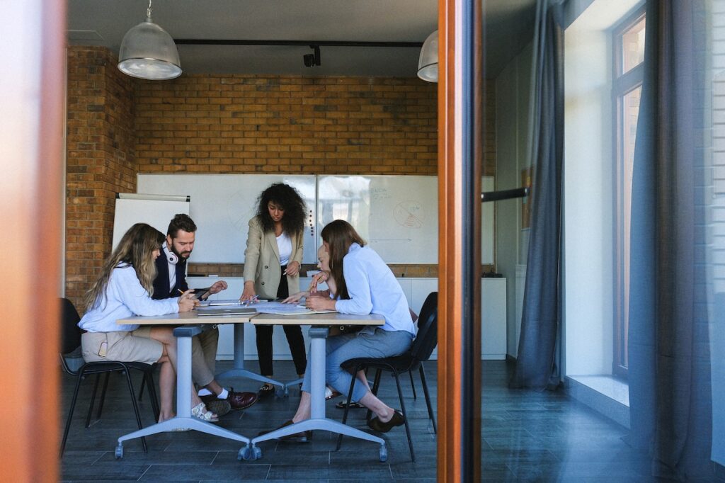 Diverse businesspeople talking in a conference room