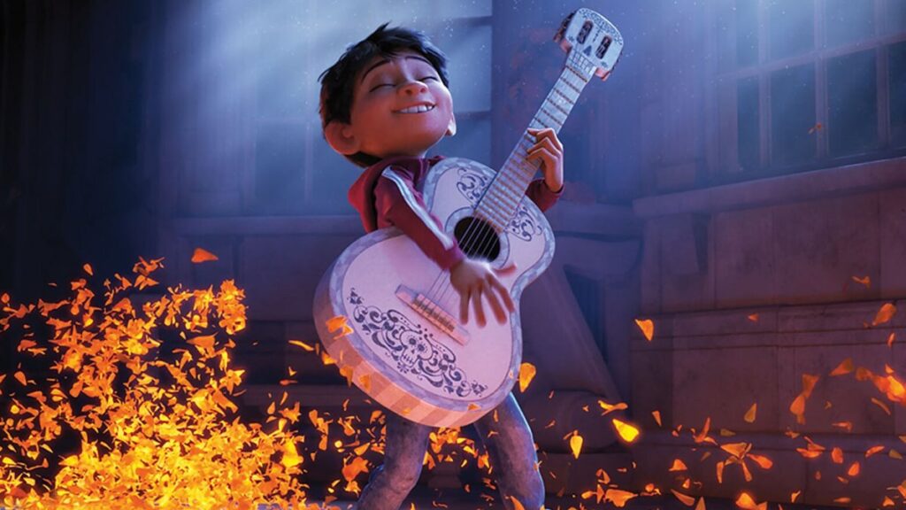 Miguel playing his guitar in Coco