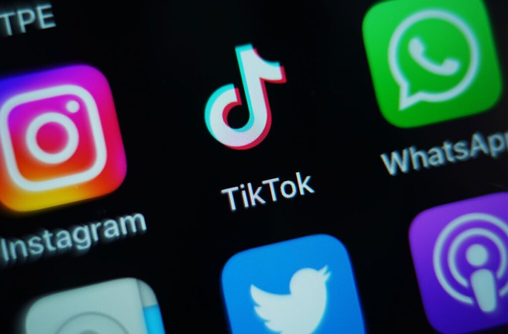 TikTok now lets you choose how much AI-generated content you want to see The app for TikTok on a phone screen. Cabinet Office minister Oliver Dowden, has confirmed TikTok will be banned on Government devices following a review. Picture date: Thursday March 16, 2023. (Photo by Yui Mok/PA Images via Getty Images)