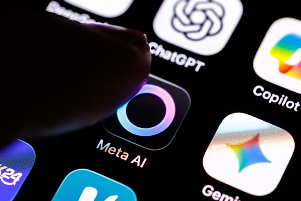 The logo of the Meta AI app can be seen on the display of a smartphone.