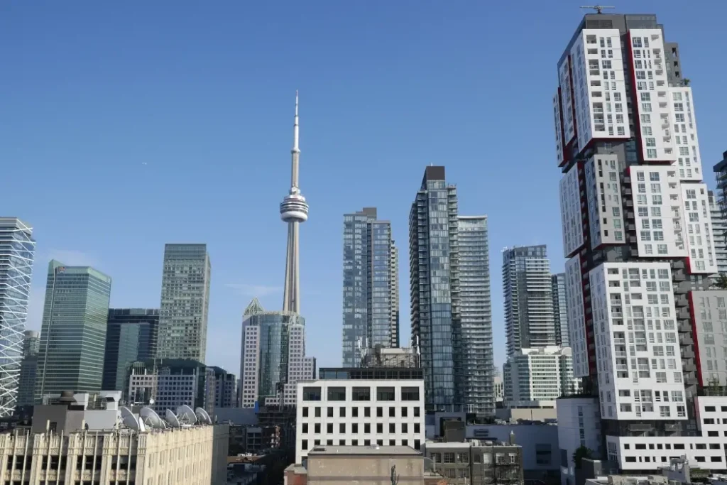 How Toronto is using Clariti’s AI to speed up building permit approvals The Toronto skyline with the CN tower prominently featured.