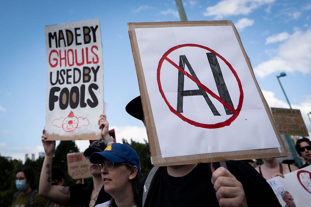 AI was supposed to win people over by now — it hasn’t A sign opposed to AI is held during a protest against AI data centers in Vancouver, British Columbia, Canada, on Saturday, June 27, 2026. Canadians aren't universally sold on building sovereign compute, with early signs of protest against AI server farms in British Columbia and Manitoba. Photographer: Ethan Cairns/Bloomberg via Getty Images
