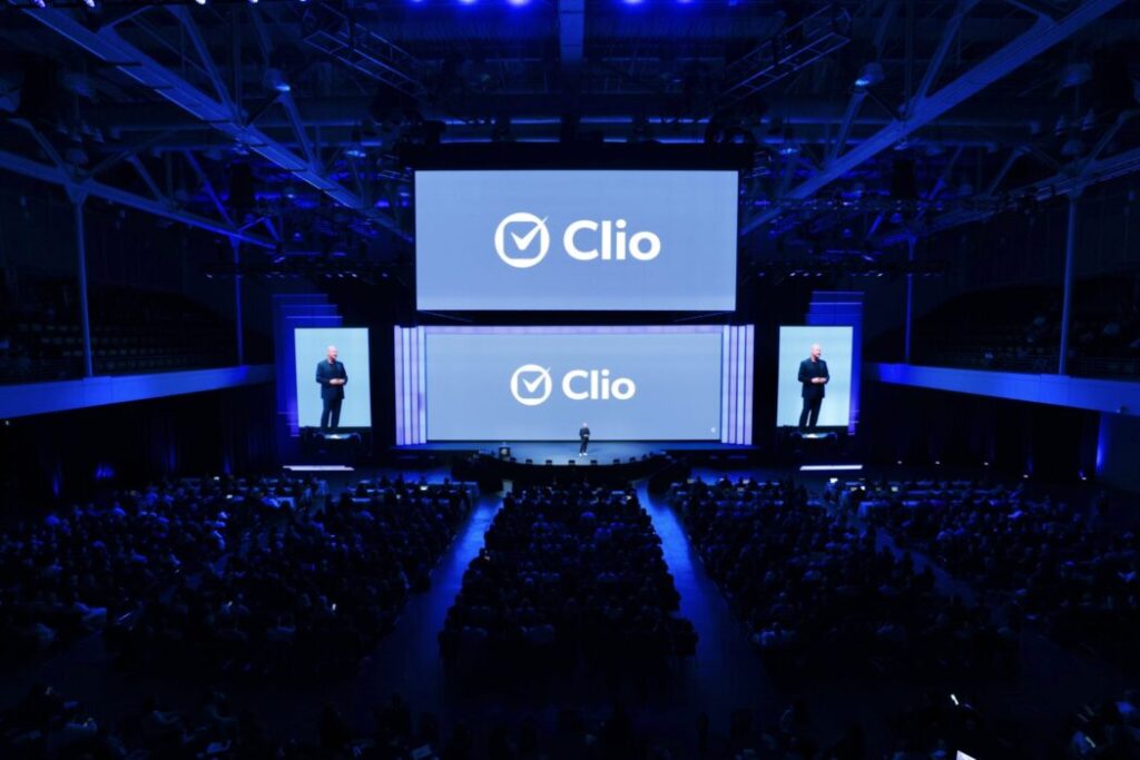 Clio acquires Page to support push into proactive legal intelligence A wide shot of the ClioCon stage